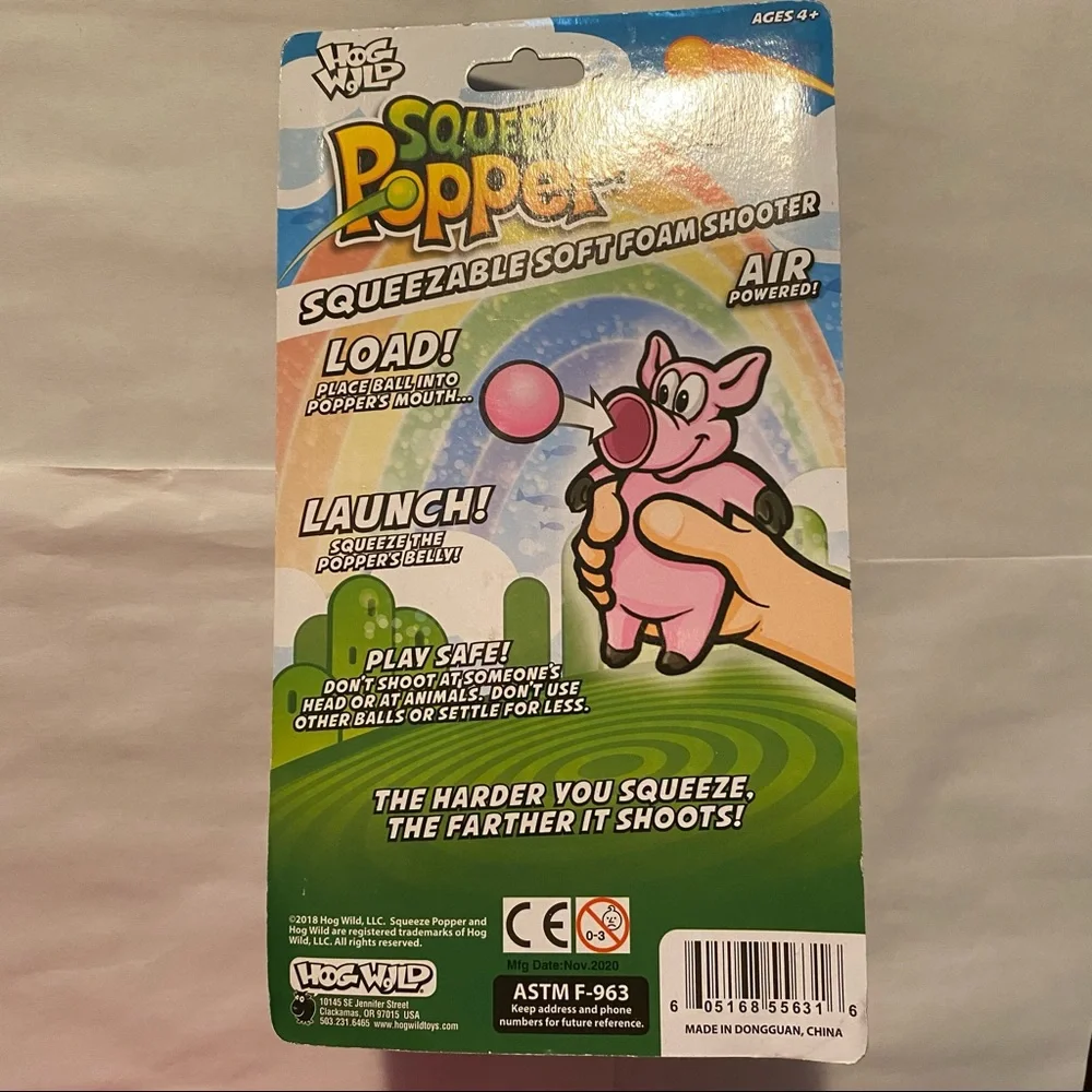 Hog Wild Squeeze Popper Narwhal Action Figure + 4 Soft Balls